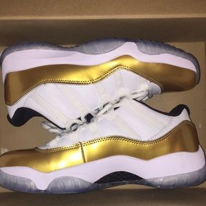 Gold & Whit Jordan 11’s